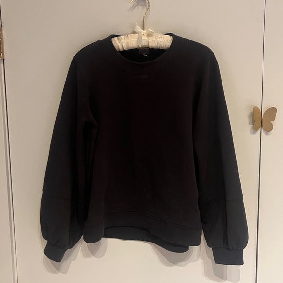 CALIA black sweatshirt with subtle bell sleeves - Picture 1 of 4